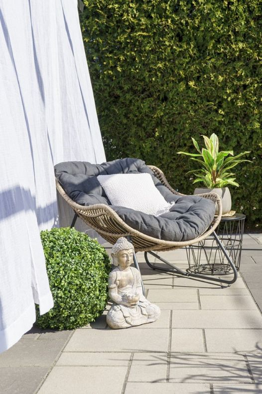 Statue buddha dans une pergola - Décors Véronneau