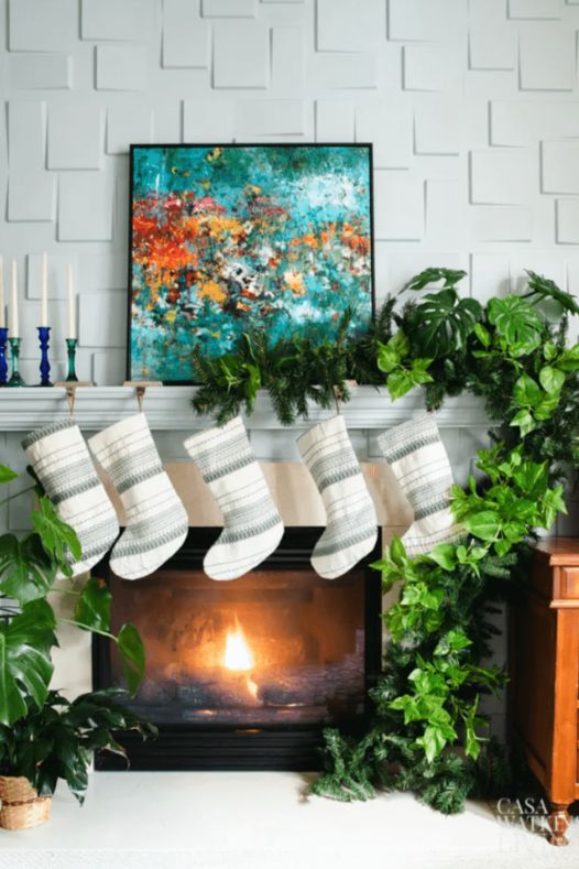 Décoration manteau de foyer avec plantes pour Noël - Décors Véronneau