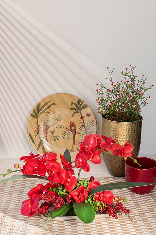 Centre de table formé d'orchidées rouges tropicales - Décors Véronneau