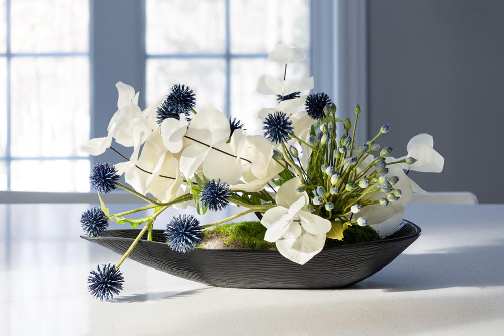 Eucalyptus blanc artificiel dans un centre de table - Décors Véronneau