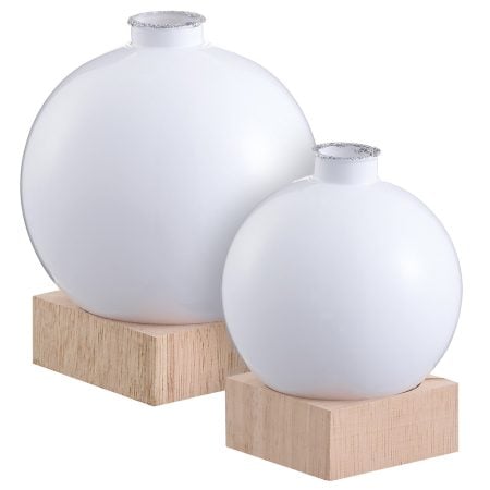 White Christmas ball vase on a wooden stand