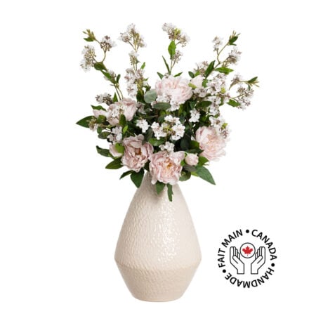 Bouquet of pale pink peonies and osmanthus