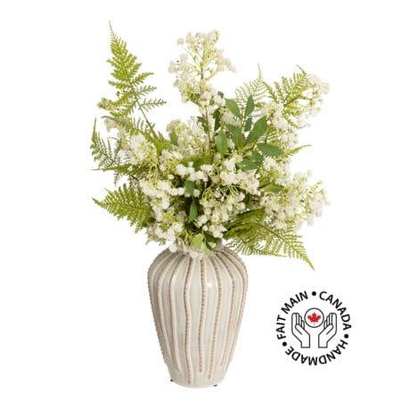 Bouquet of small white flowers and ferns