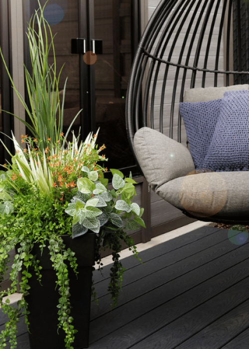 Artificial plant and orange flower outdoor planter, 52''