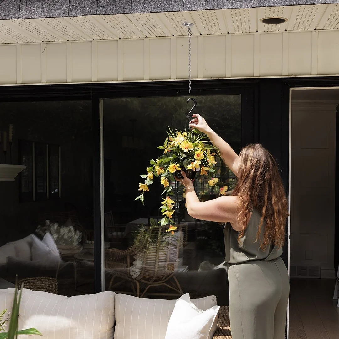 Outdoor hanging planter of yellow hibiscus, 18 x 16